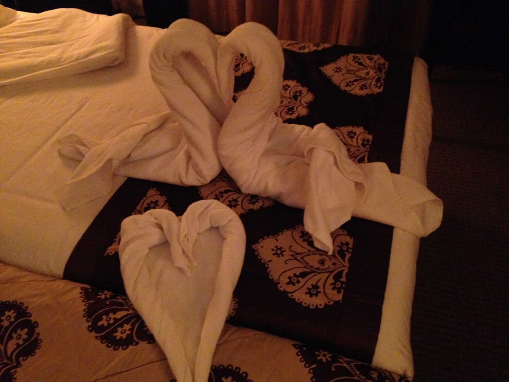 Towel creation with swan and heart